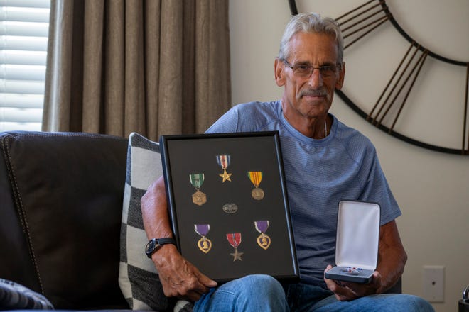 Bart Fabian, who recently was awarded a second Silver Star for heroism as a medic in Vietnam -- 51 years after the act, talks about his time in Vietnam at his home in Aberdeen, NJ Wednesday, August 5, 2020. He framed his first Silver Star, two Purple Hearts, two Bronze Stars, Army Commendation for Valor medal and a Combat Medic Badge.