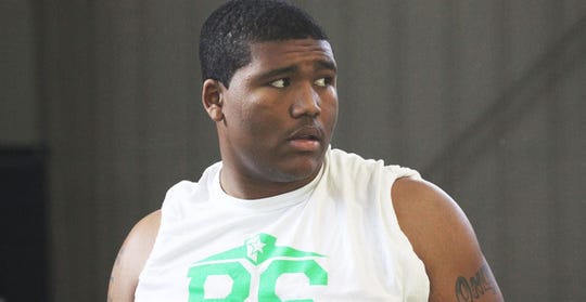 Detroit Loyola defensive tackle Derrick Harmon, a Michigan State verbal commit, checked in at 6-foot-4u00bd, 359 pounds at last weekend's Rising Stars Top 175 camp.