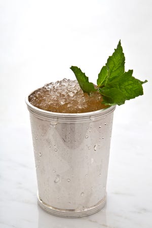 The traditional drink of the Kentucky Derby, the Mint Julep, is a must at any home Derby party.