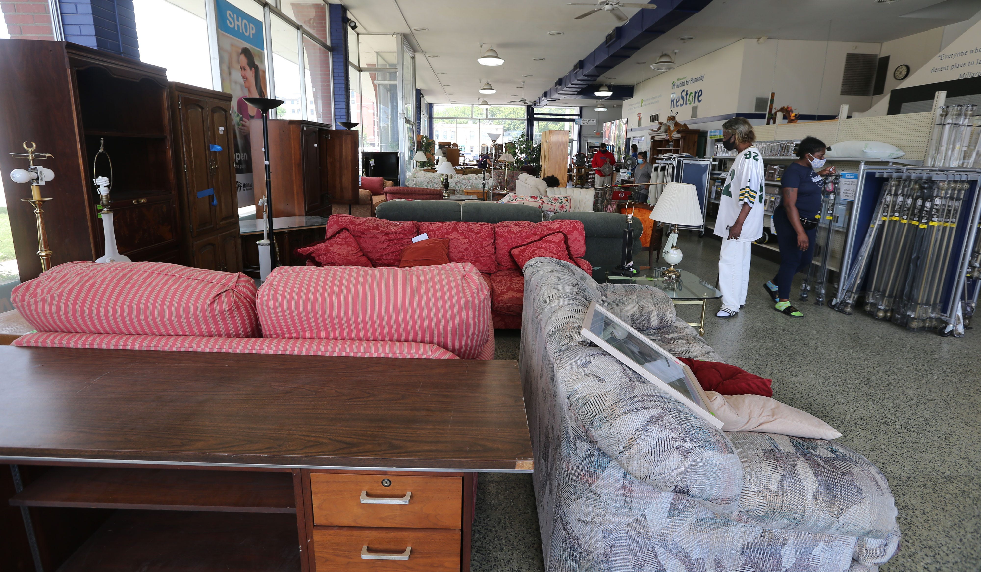 Customers browse inside the Milwaukee Habitat for Humanity Restore at 420 S. 1st Street. Proceeds from the home improvement stores and donation centers are used towards affordable housing.