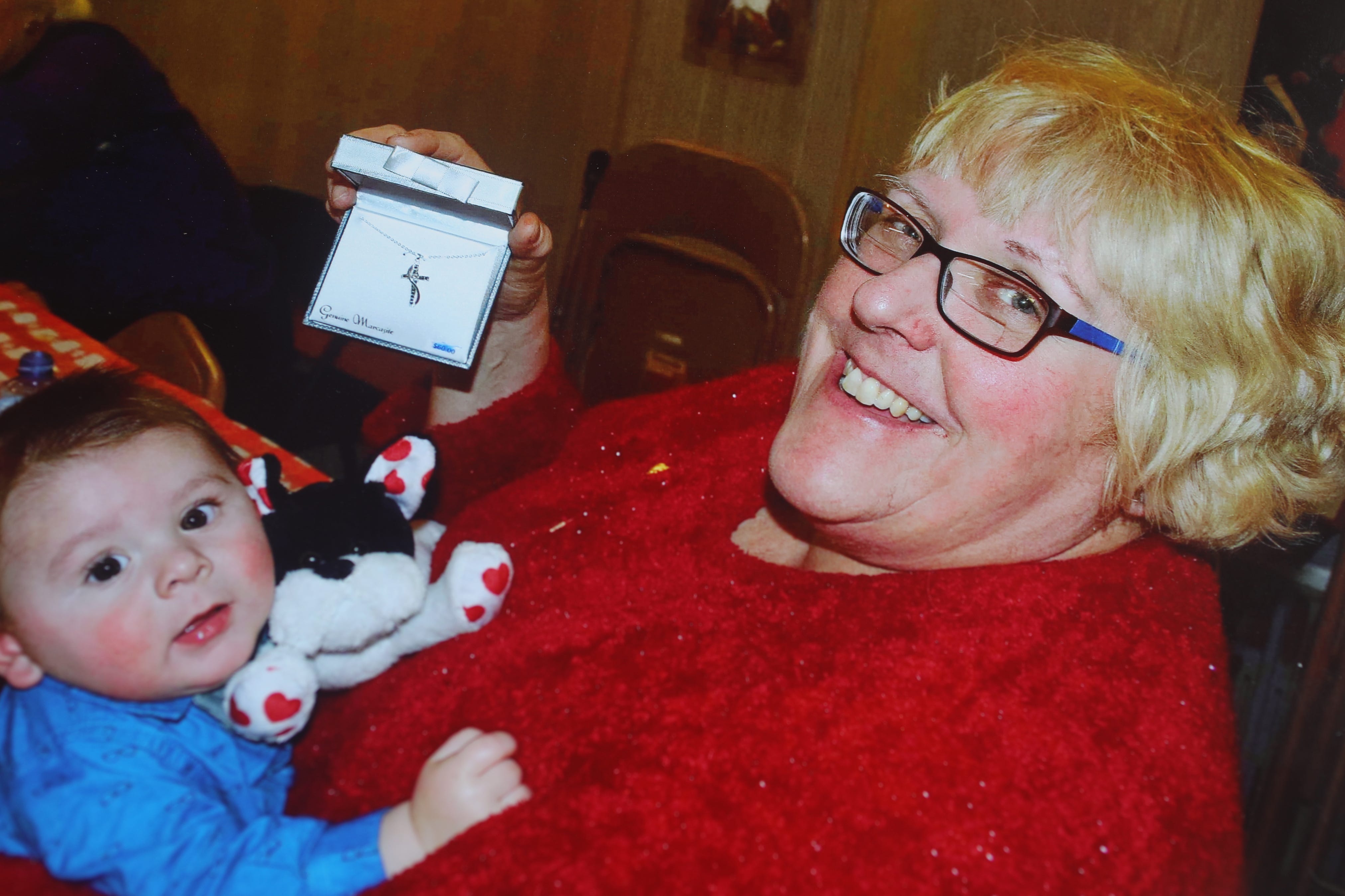 Barbara Birchenough is shown in a family photo with one of her three grandsons.   