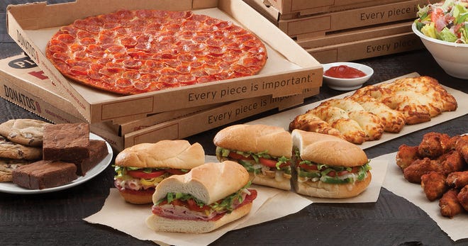 Donatos catering includes pizza, subs, wings, dessert and more. The restaurant is opening three Sarasota locations.

[PROVIDED PHOTO]