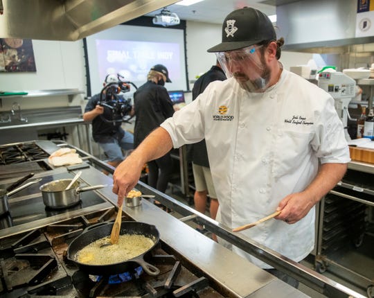 Josh Cooper stirs butter as he works on making a sugar cream pie creation during the filming of World Food Championships, at Ivy Tech Community College, Indianapolis, Sunday, Aug. 9, 2020. This final round of the weekend's competition pits three cooks in a sugar cream pie contest. 