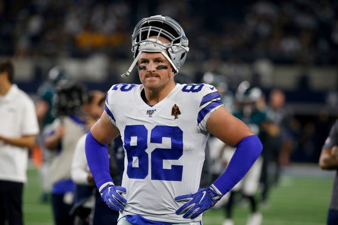 Dallas Cowboys' Jason Witten (82) warms up before an October 2019 game against the Philadelphia Eagles in Arlington, Texas. After 16 seasons in Dallas and one in the "Monday Night Football" booth, Jason Witten now is adjusting to a new home with the Las Vegas Raiders.