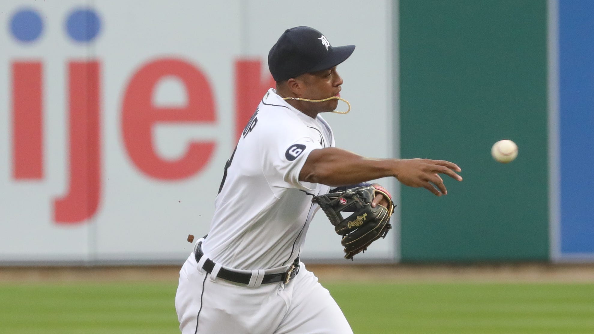 Tigers second baseman Jonathan Schoop throws White Sox catcher Yasmani Grandal out at first base during the second inning at Comerica Park on Monday, August 10, 2020.