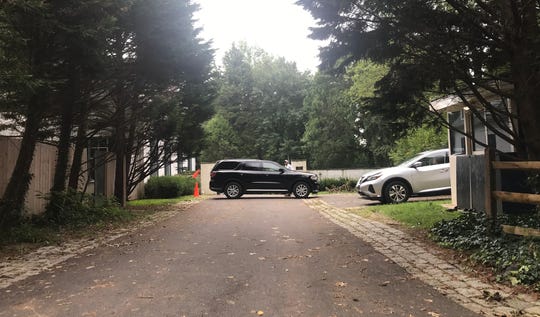 A black SUV sits outside Joe Biden's Greenville, Delaware residence on Tuesday as speculation about his pick for a vice presidential candidate ramped up.