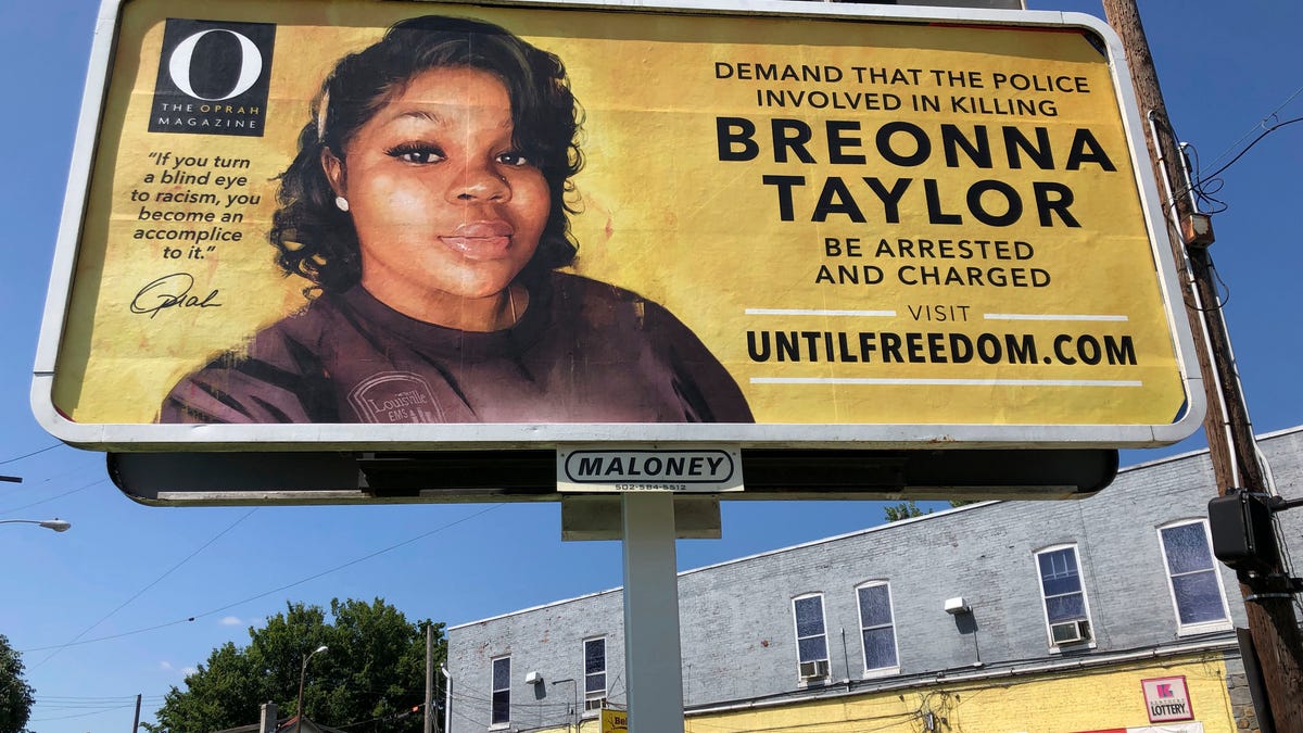 A billboard sponsored by O, The Oprah Magazine, is on display with with a photo of Breonna Taylor, Friday, Aug. 7, 2020 in Louisville, KY. Twenty-six billboards are going up across Louisville, demanding that the police officers involved in Taylor's death be arrested and charged.  Taylor was shot multiple times March 13 when police officers burst into her Louisville apartment using a no-knock warrant during a narcotics investigation. No drugs   were found.