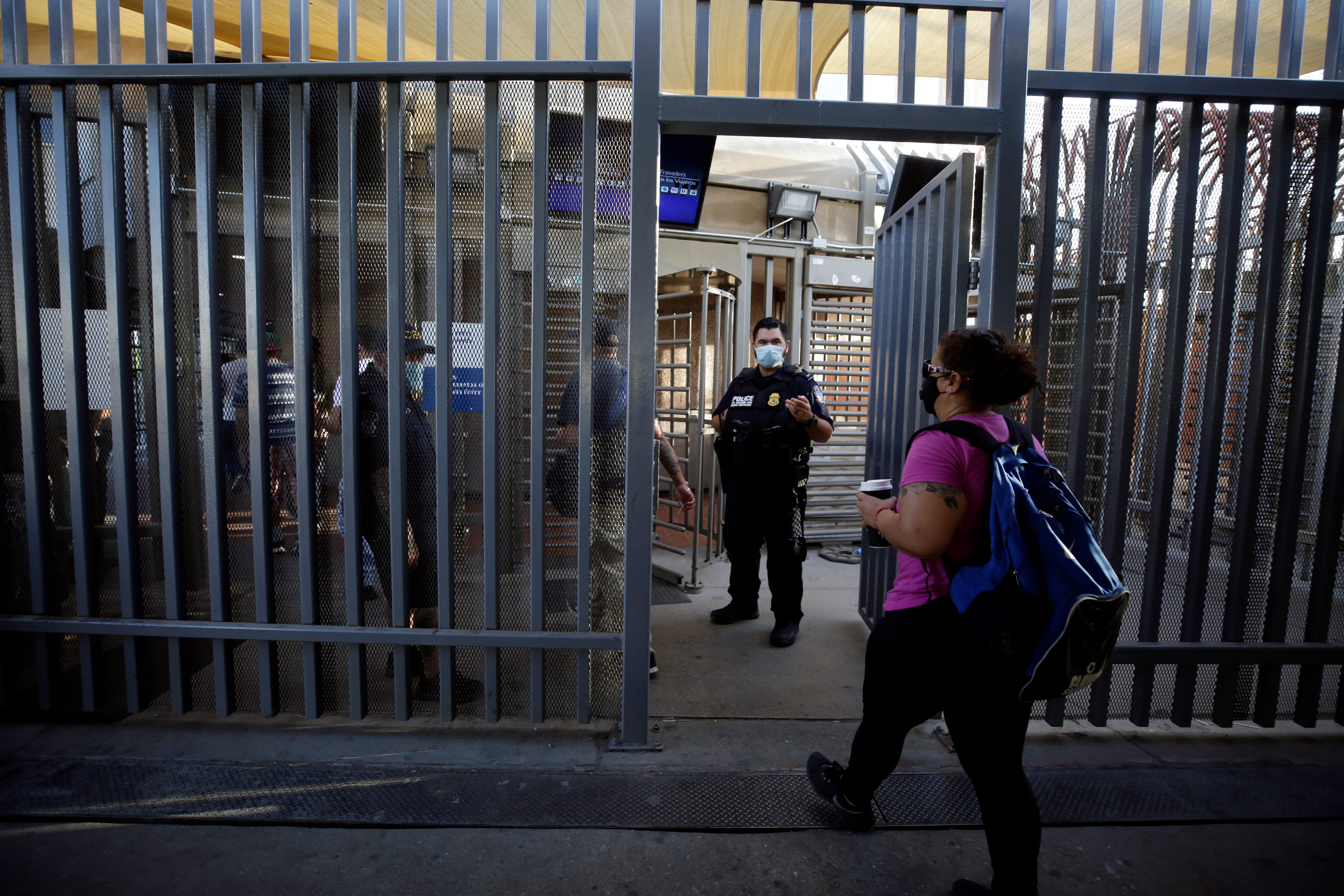 Dulce Garcia crosses the border from Mexicali, Mexico, to Calexico, Calif., where she works.