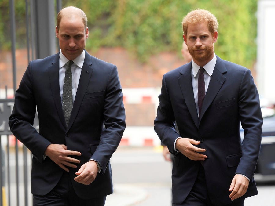 Prince William, left, says he hasn't spoken yet with his brother Harry since an interview stirred up royal tensions.