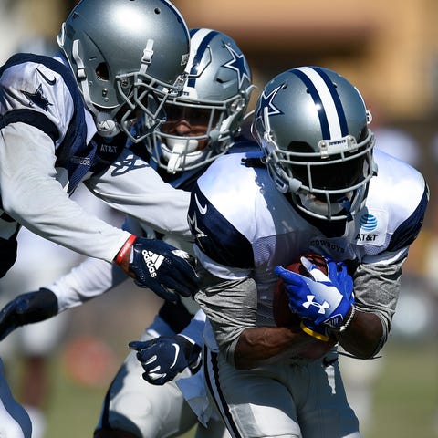 Cowboys players take part in training camp in 2019
