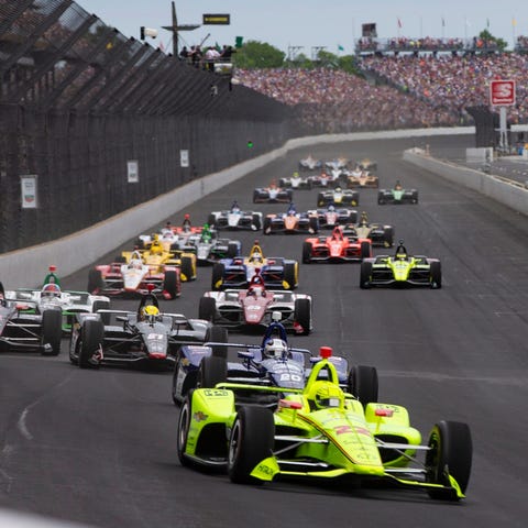 Simon Pagenaud leads the pack at the start of the 