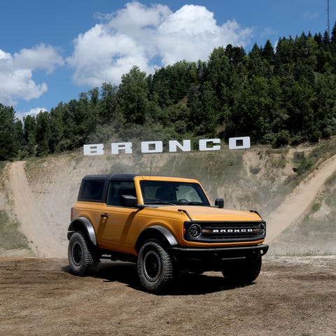 A 2021 Bronco two-door comes up the hill during th