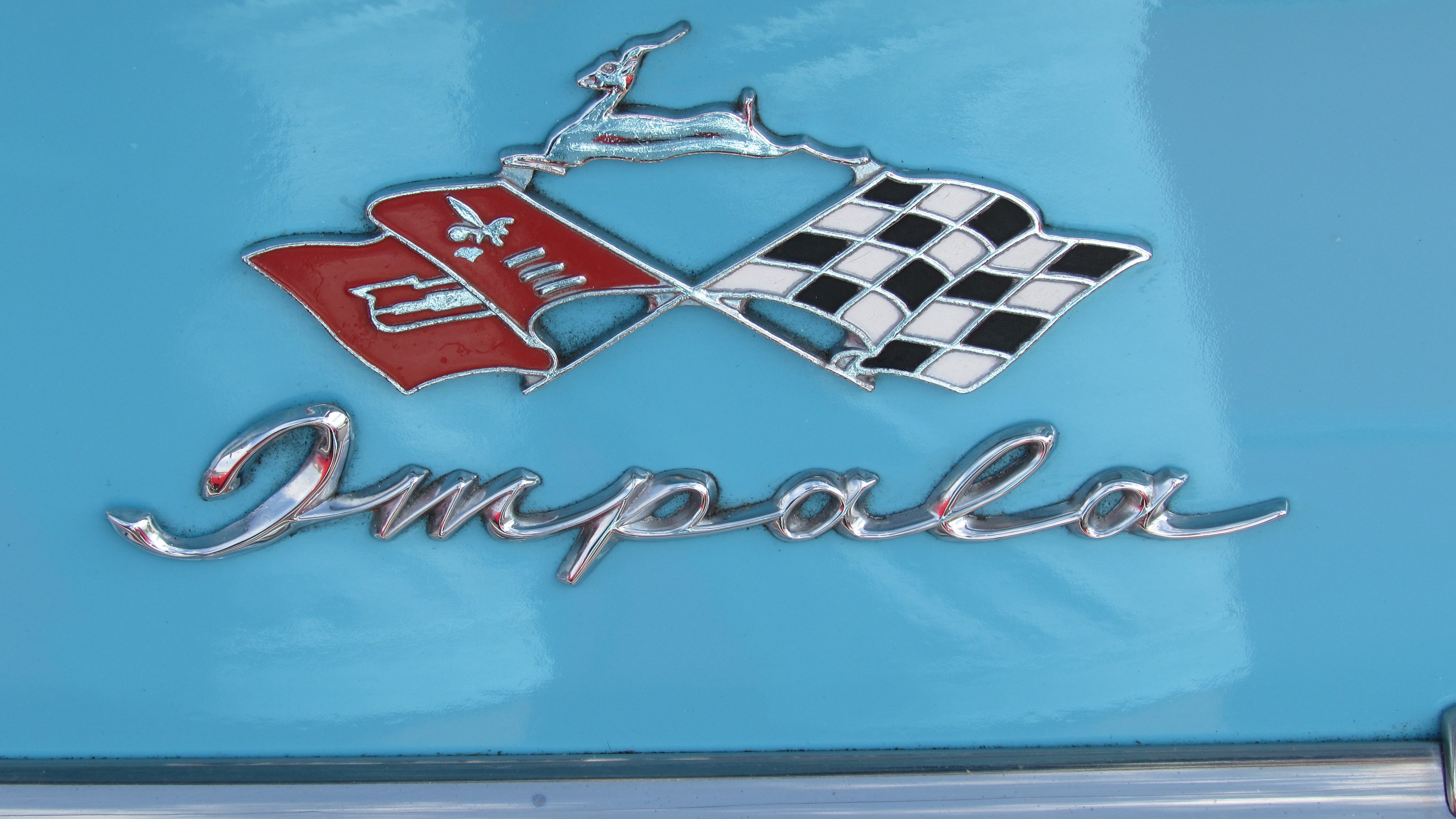 There are many decorative parts to cars, including logos such as this Impala’s.