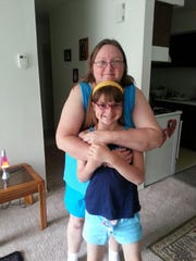 Tina Greiger, 47, and her daughter, Kristina, 11, are shown in a recent photo provided by the family. Tina Greiger, 47, and her daughter, Kristina, 11, were found just before 3 p.m. on July 30, 2013, in their second-floor unit on North Grange Street in the Parkway Village apartments.