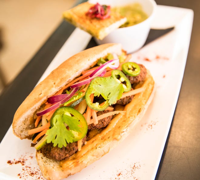 The Green Cup Cafe is located on Dean Street in downtown Fort Myers. This is a falalfel bahn sandwich. .