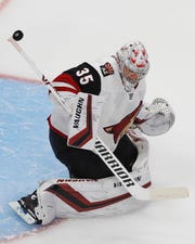 Aug 14, 2020; Edmonton, Alberta, CAN; Arizona Coyotes goaltender Darcy Kuemper (35) makes a save during warmup against the Colorado Avalanche in game two of the first round of the 2020 Stanley Cup Playoffs at Rogers Place. Mandatory Credit: Perry Nelson-USA TODAY Sports