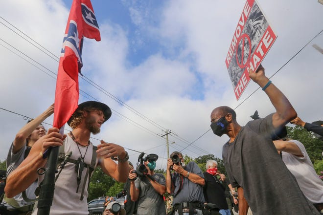 'Far-right' demonstrators, commie counter-protesters and poLICE clash in multiple states 72cfce46-20ba-4c57-a002-05bf0e165876-AP_APTOPIX_Racial_Injustice_Georgia_Protest