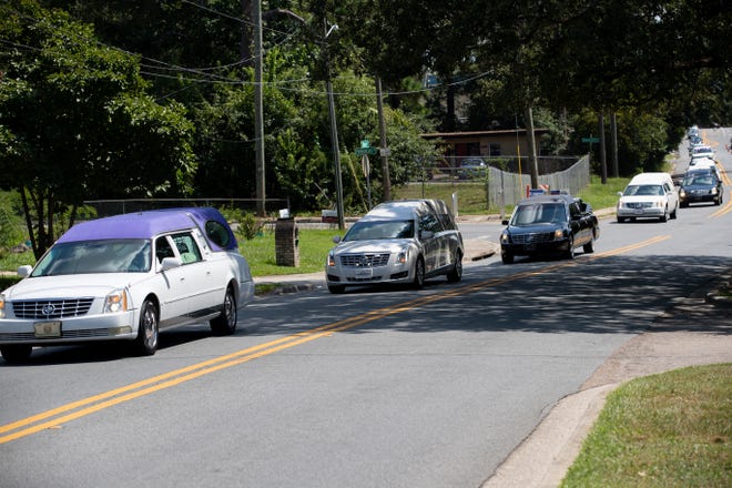 Nineteen hearses make their way north on Basin Street in a procession organized by local funeral home directors to highlight gun violence in Leon and Gadsden counties Sunday, August 16, 2020. 