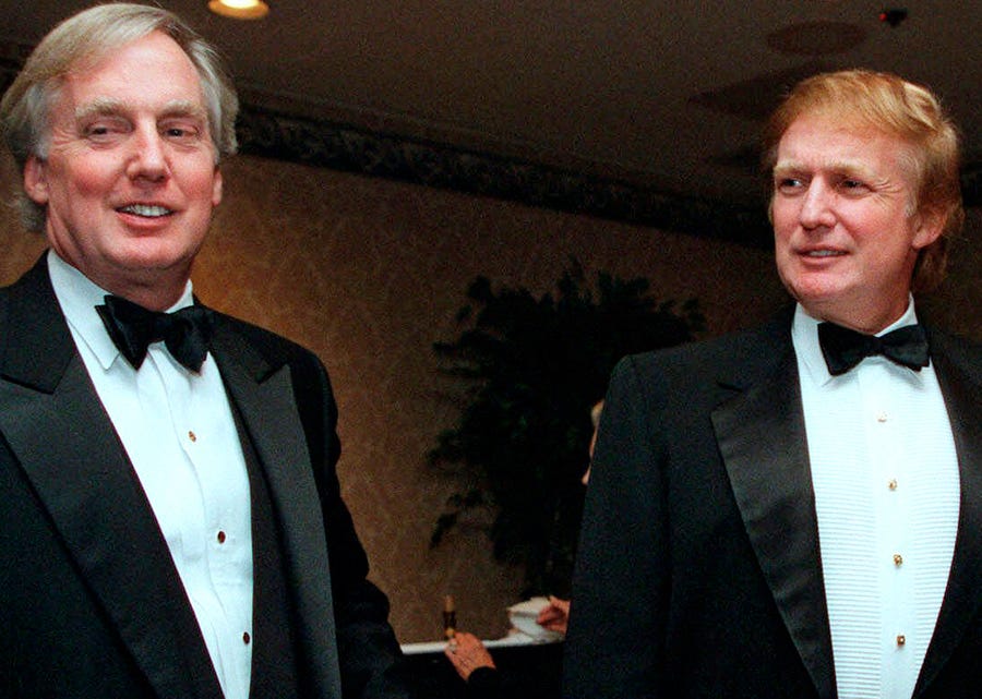 Robert Trump (left) is pictured joining then real estate developer and presidential hopeful Donald Trump (right) at an event in New York. Robert Trump died on Saturday after being hospitalized in New York, the president said in a statement. He was 71.