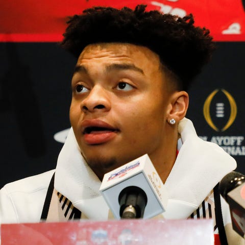 Ohio State quarterback Justin Fields meets with th