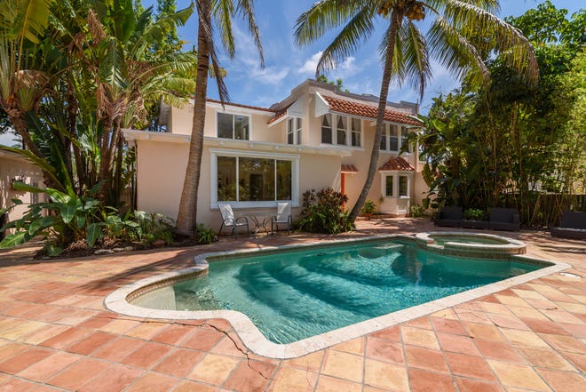 The 1923 vintage home on 1723 Bay Street in Sarasota is on the market for $699,000 through Lin Dunn and Maurice Menager of Michael Saunders & Company. The 2,237-square-foot, two-story home has four bedrooms and three baths. The house is set back from the street and enclosed like a courtyard promised a lot of privacy and quiet. The pool is at the front and blends with gardens to be part of the landscape.