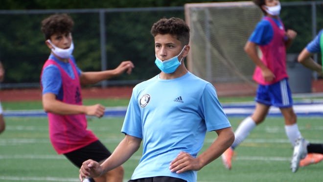 Catholic Central Soccer Embraces Coronavirus As Obstacle To Overcome