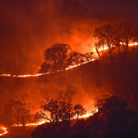 The Marsh Fire, shown burning on a hillside in Bre