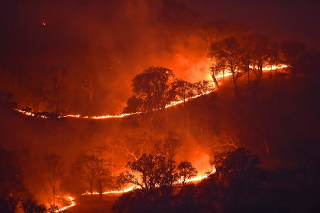 The Marsh Fire, shown burning on a hillside in Brentwood, is one of 29 active wildfires in California, according to the state's Department of Forestry and Fire Protection.