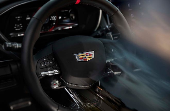 The 2022 Cadillac CT5-V Blackwing and CT4-V Blackwing will feature a performance steering wheel meticulously crafted with leather and cut-and-sewn stitching, a 12 o’clock red racing stripe, carbon fiber trim and a V-Series emblem. Pre-production steering wheel shown. Actual production steering wheel may vary.