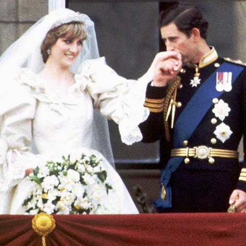 Prince Charles kisses the hand of his new bride, P