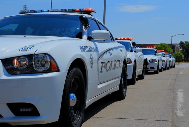 Bartlesville Police vehicles.