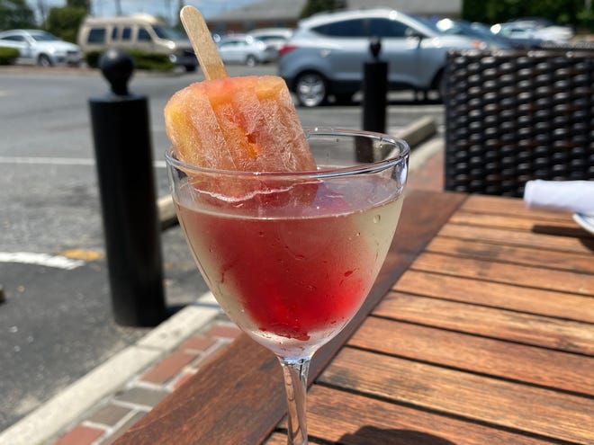 This Champagne Milk Punch goes up a notch with the addition of a Peach-Berry Prosecco Pop from Farm & Fisherman Tavern in Cherry Hill.