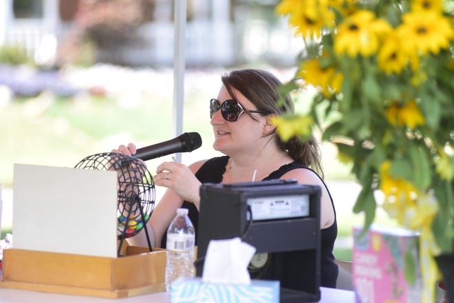 Courtney Moody, activities coordinator for the Crawford County Council on Aging, reads a bingo number during an event in 2020. Moody has released a schedule of events for May, and promises to have "way more planned for June."