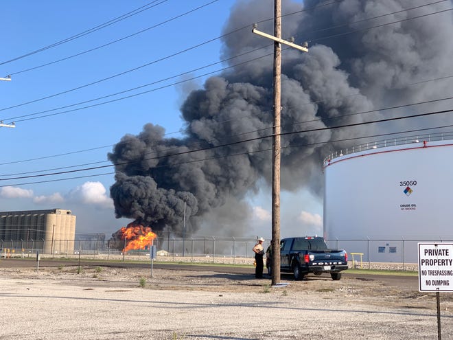 Smoke and flames are seen from a major fire near Lantana and Up River road in Corpus Christi, Texas on Aug. 21, 2020.