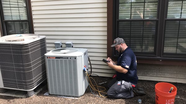A service technician for Christian Heating and Air