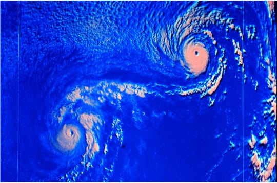 An example of the Fujiwhara effect occurred in 1974, when Hurricanes Ione and Kirsten spun about each other in the eastern Pacific. This satellite image shows Ione on the left and Kirsten on the right.