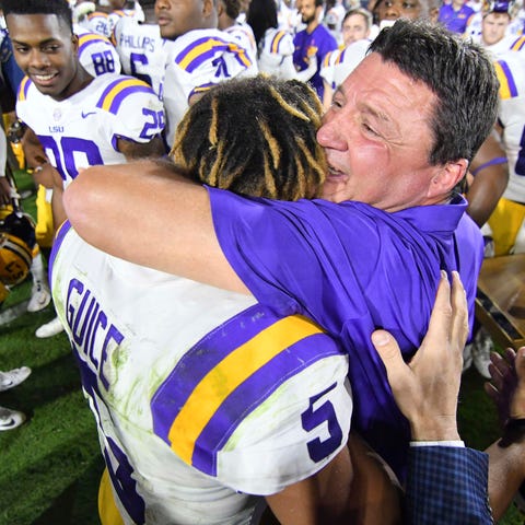 Ed Orgeron and Derrius Guice after a 2017 LSU win 