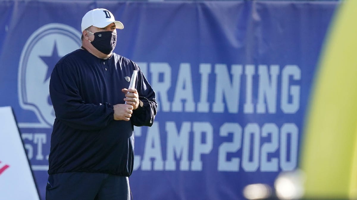 Dallas Cowboys head coach Mike McCarthy watches during an NFL football training camp practice in Frisco, Texas, Friday, Aug. 14, 2020.