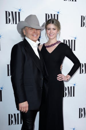 dwight yoakam emily joyce wife fiancee marries wedding boy small country child married his welcome associated press artist baby shows