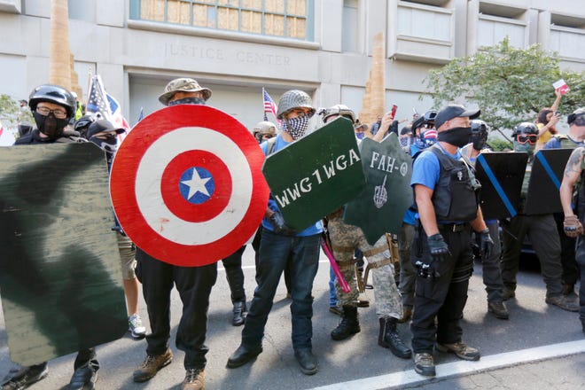 Left-wing and right-wing protesters battle with tear gas, paintballs and rocks in downtown Portland in August 2020.