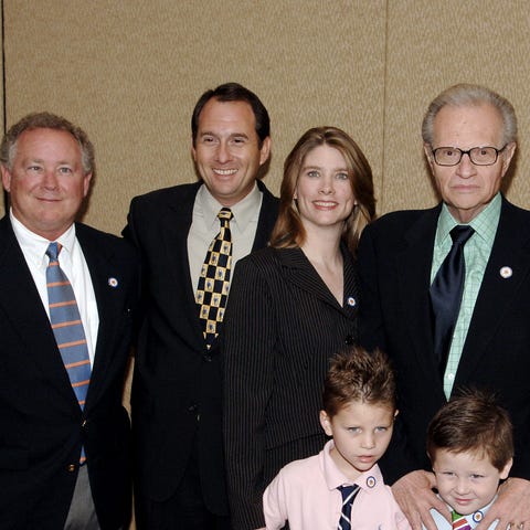 In this file photo, Larry King poses with his fami