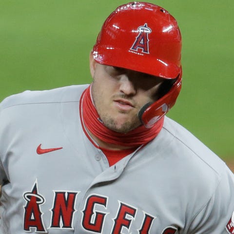 Mike Trout rounds the bases after hitting a two-ru