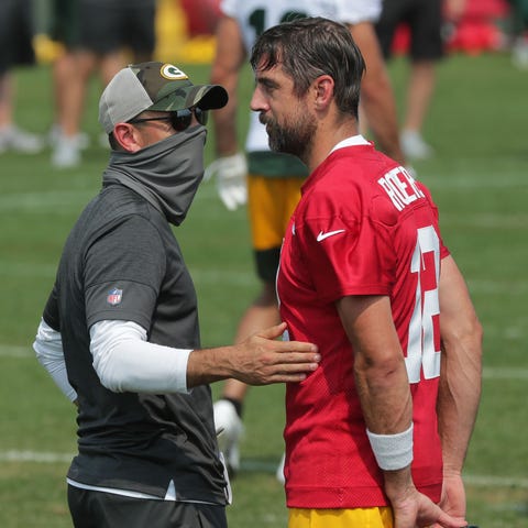 Green Bay Packers head coach Matt LaFleur, left, t