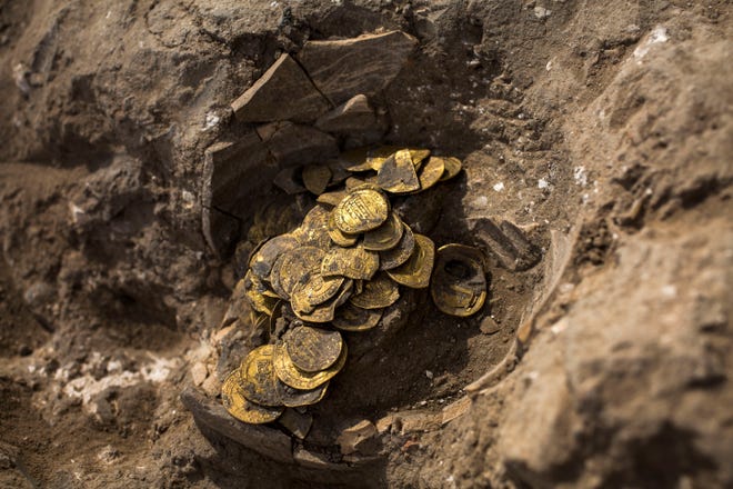 A hoard of gold coins discovered at an archeological site in central Israel, Tuesday, Aug 18, 2020.