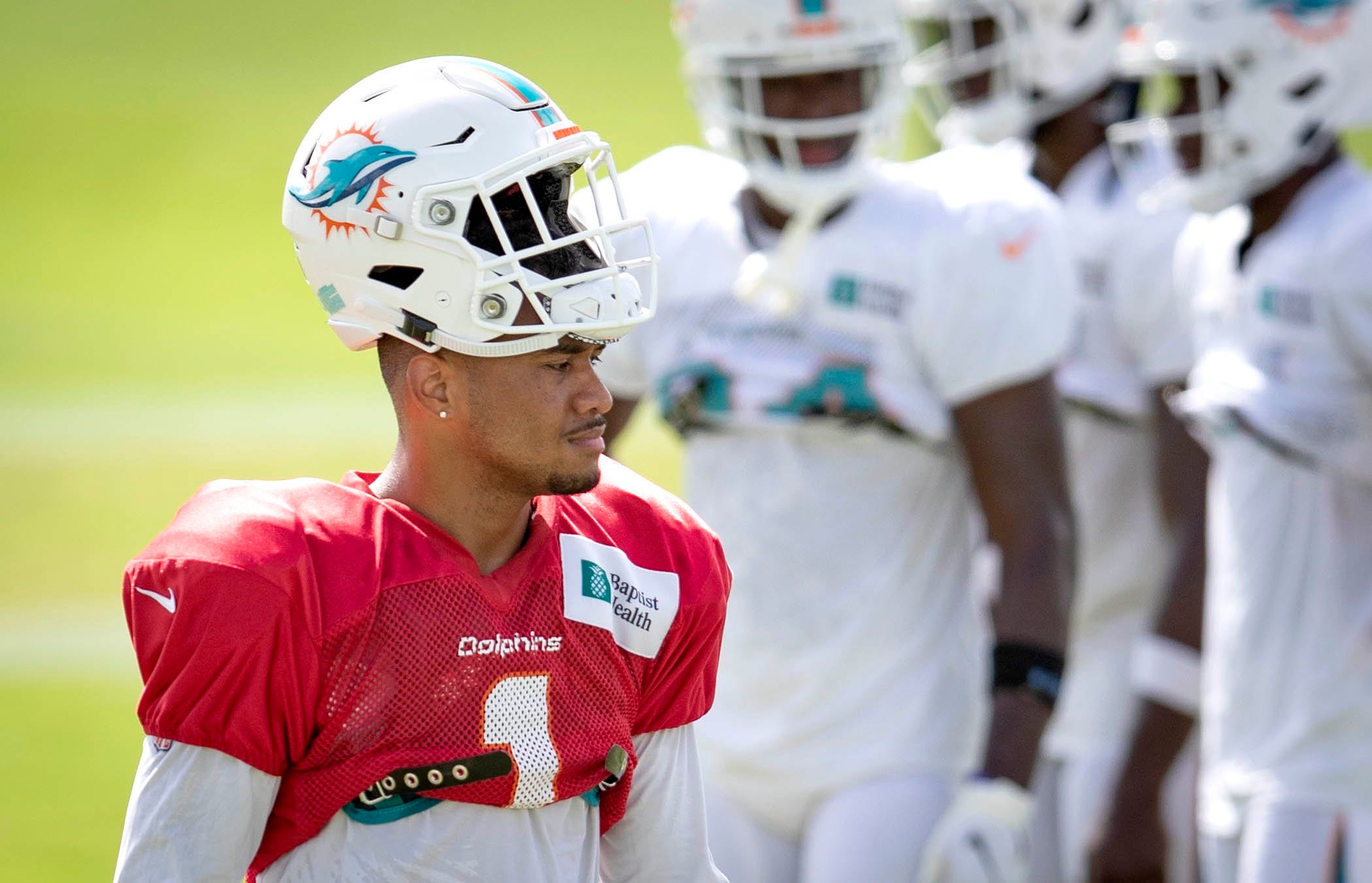 tua in dolphins uniform