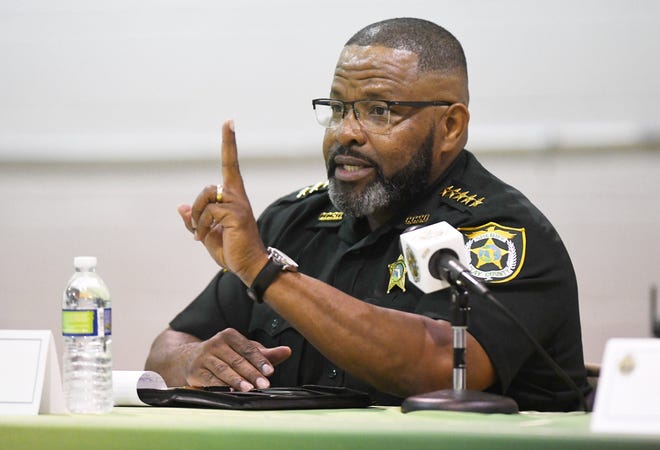 Now suspended Clay County Sheriff Darryl Daniels addresses questions from residents during a town hall gathering on Aug. 4. Wednesday he waived his court appearance but entered not-guilty pleas to charges through his attorney.