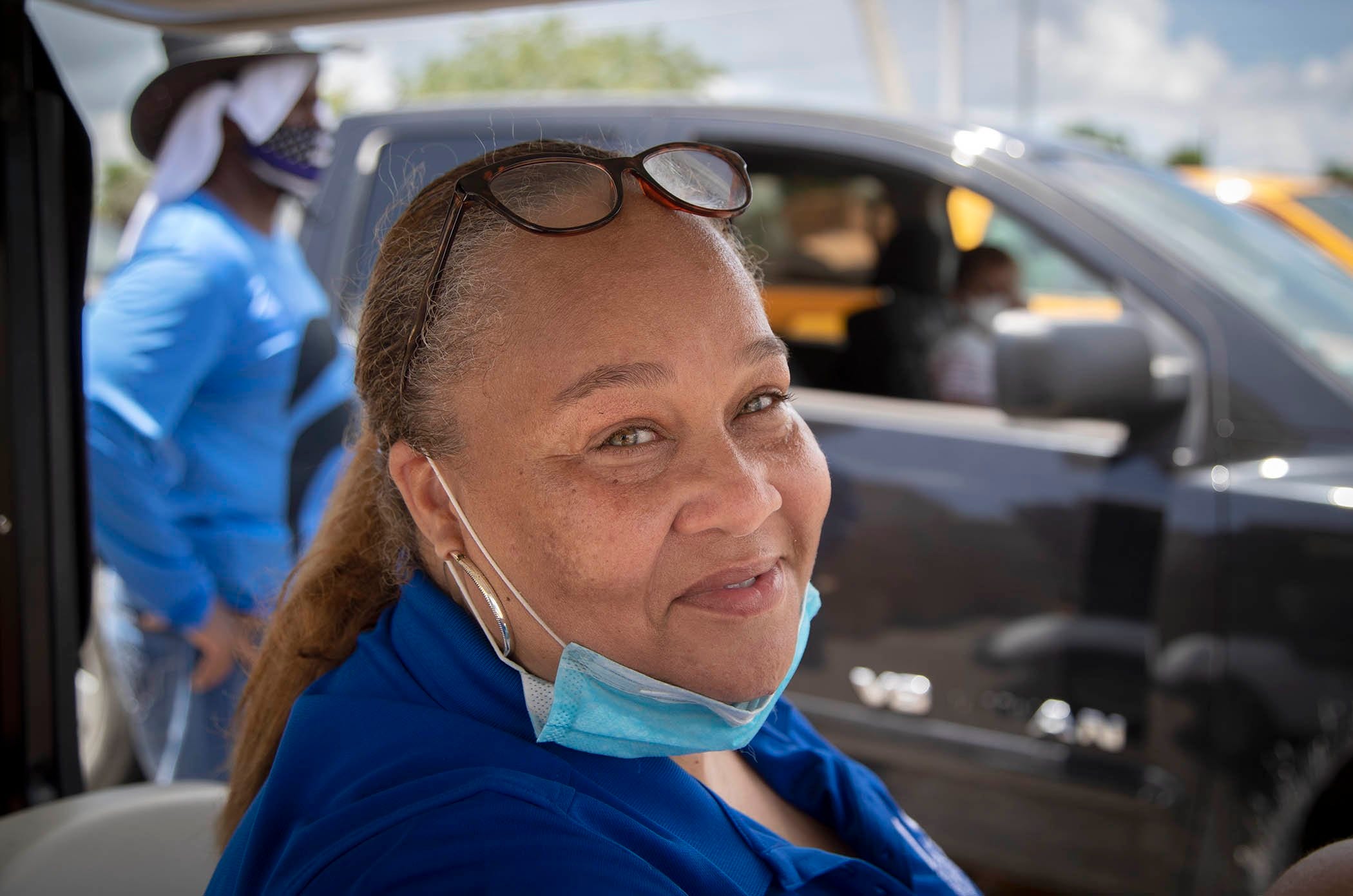 Tammy Jackson Moore helped start, the non-profit, Guardians of the Glades. Every Friday she coordinates in one of the tri-city area centers a food distribution and coronavirus testing site. She helped distribute 100,000 pounds of food in South Bay, July 24, 2020.