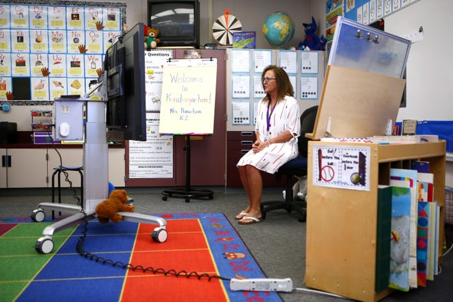 Landau Elementary School kindergarten teacher Marci Danielson gives live instruction during Palm Springs Unified School Districts' first day of distance learning in Cathedral City, Calif., on Wednesday, August 5, 2020. 