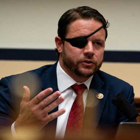 WASHINGTON, DC - JULY 22: Rep. Dan Crenshaw (R-TX) speaks as Peter T. Gaynor, Administrator of the Federal Emergency Management Agency (FEMA) testifies during a hearing before the House Committee on Homeland Security on Capitol Hill July 22, 2020 in Washington DC. (Photo by Anna Moneymaker-Pool/Getty Images) ORG XMIT: 775538365 ORIG FILE ID: 1227737542