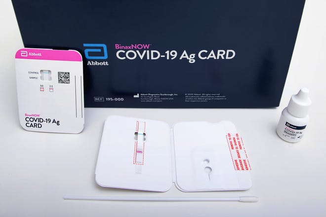 This image provided by Abbott Laboratories in August 2020 shows the company's BinaxNOW rapid COVID-19 nasal swab test. The Food and Drug Administration on Aug. 26, 2020, authorized BinaxNOW, the first rapid coronavirus test that doesn’t need any special computer equipment to get results.